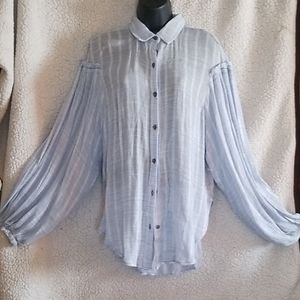 Free People Baby Blue Puff Sleeve shirt.